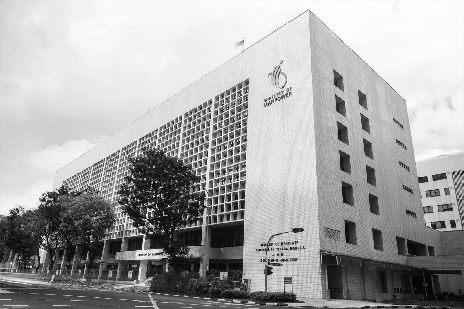 Image shows a building with many windows. 