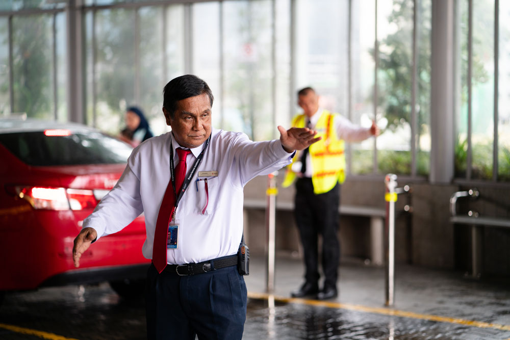 Frasers Property Singapore - Security guards going about their daily routine