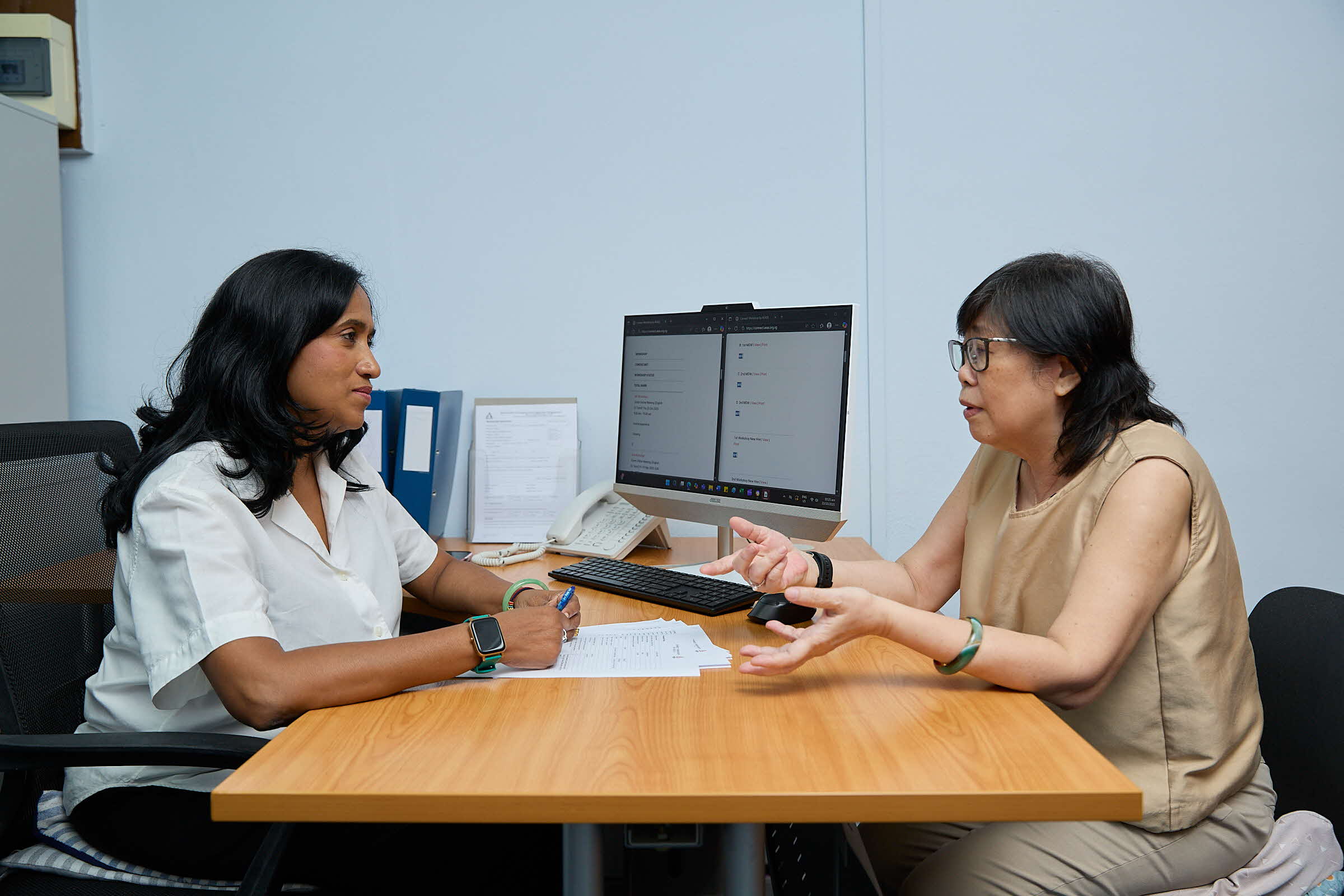 A consultant discussing with a potential employer